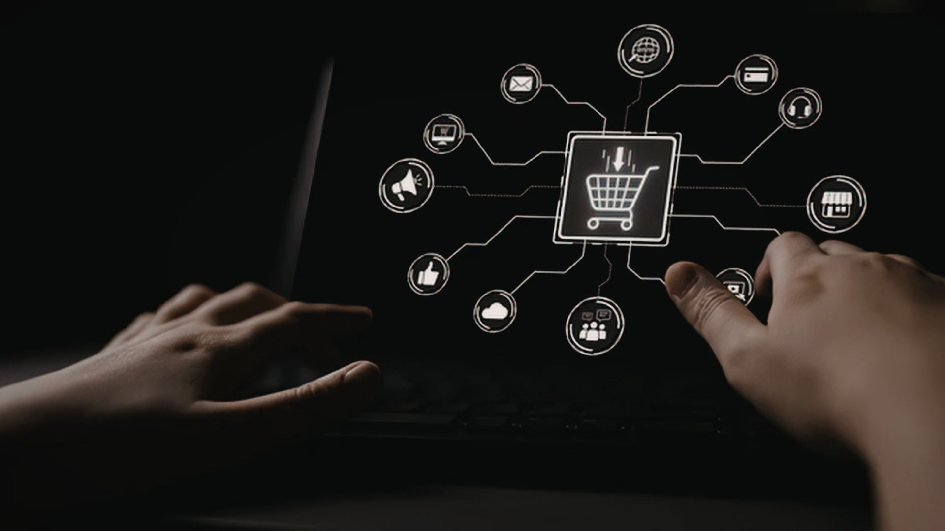 A high-tech, low-light view of a person’s hands interacting with a laptop screen showing a glowing digital shopping cart icon. The central cart is connected via white line nodes to various marketing channel icons, including social media, email, megaphone, and storefront symbols, representing a unified omnichannel e-commerce strategy by MetaBaz.