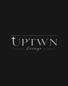 A sleek monochrome hospitality logo featuring the word 'UPTWN' with a stylized upward arrow integrated into the letter U, and 'Lounge' in elegant script typography between two thin horizontal lines on a solid black background, showcasing a premium shisha lounge and upscale nightlife venue portfolio feature optimized for professional videography and cinematic media production services by MetaBaz.